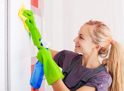 Professional facade cleaning on a building exterior in E17