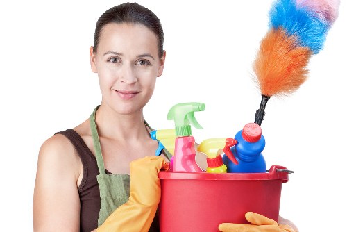 Professional upholstery cleaning service for a fabric sofa in E17