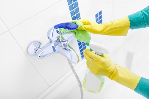 Cleaner in E17 deep cleaning kitchen and bathroom surfaces
